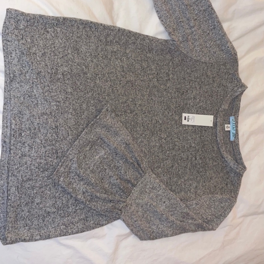 Gray knit top with ruffle sleeves